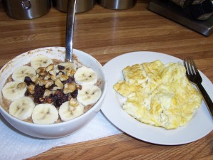 Oat bran with cinnamon, vanilla, banana, raisins, flaxseed, and walnuts with 1/2 cup of egg white + 1 whole egg
