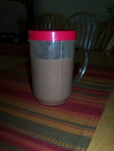 1 cup of soymilk, 2 tbs of vegetable protein powder, 1 tbs of cocoa powder, 2 packets of Stevia, ice